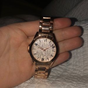 Rose gold woman’s watch